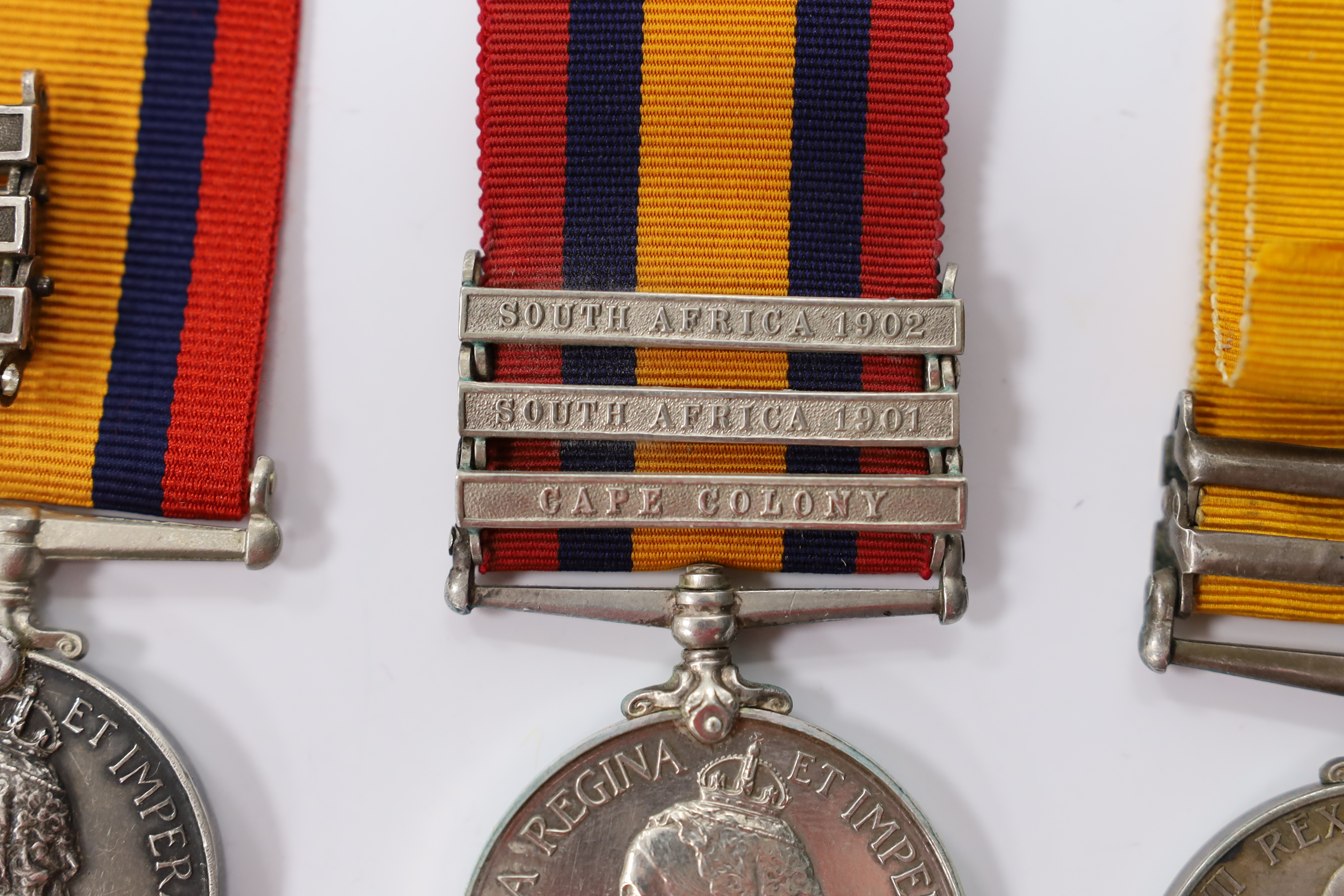 Assorted medals; two replica British North Borneo medals; Balaklava medallion; bronze GV medal; German China Campaign medal; bronze NRA medallion, unnamed